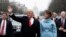 U.S. President Donald Trump and first lady Melania Trump walk during the inaugural parade from the U.S. Capitol in Washington last month. 