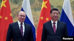 Владимир Путин и Си Цзиньпин в Пекине 4 февраля