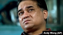 Уйгурський учений та правозахисник Ільгам Тохті, архівне фото, 2013 рік