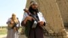 FILE: Taliban fighters in Afghanistan (June 2018).