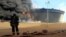 Последствия атаки боевиков "Исламского государства" на нефтехранилище в центральной Ливии. Январь 2016 года