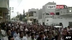 صحنه ای از تظاهرات مخالفان بشار اسد در شهر حما