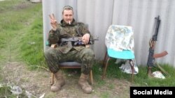 “Well, it is about fascism here. Fascism," Rustam tells RFE/RL. "They have not fully eradicated followers of Hitler and Bandera here. I came here to fight against them."