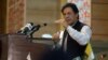 Pakistani Prime Minister Imran Khan addresses the legislative assembly in Muzaffarabad on August 14.