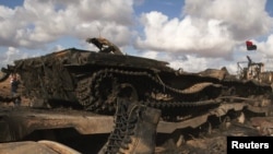 Результат авиа удара сил международной коалиции по войскам верным Муамару Каддафи на дороге между Бенгази и Адждабия, 21 марта 2011