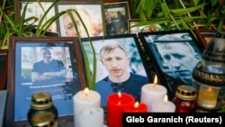 სანთლები ვიტალი შიშოვის სიკვდილის ადგილზე 