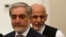 Abdullah Abdullah (L) and Ashraf Ghani (R) attend a ceremony after signing a power-sharing agreement at the Presidential Palace in Kabul, Afghanistan, 21 September 2014. 