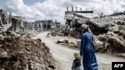 Pamje nga qyteza e shkatërruar Kobane në Siri.