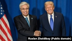 Kazakh President Qasym-Zhomart Toqaev and US President Donald Trump in September pose on the sidelines of the UN in New York on September 30.
