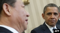Jinping dhe Obama