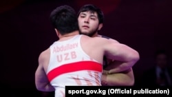 Обладатель бронзовой медали чемпионата Азии по борьбе Мурат Рамонов. Бишкек, 27 февраля 2018 года.