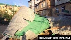 A residential building damaged from the storms in Turkmenistan's Lebap Province.