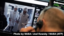 Астронаутите Боб Бенкен и Даг Харли