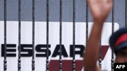 پالایشگاه «اسار» از جمله شرکت‌های بدهکار به ایران است.