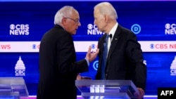 Берни Сандерс и Џо Бајден 