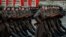 Russian servicemen dressed in historical uniforms march during a military parade on Red Square in Moscow on November 7, 2019.