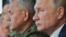 Президент России Владимир Путин и министр обороны Сергей Шойгу