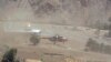 FILE: An Afghan national army helicopter lands in a remote part of Afghanistan.