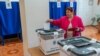 Moldova: Romanian election, vote in R. Moldova, people at polling station in Ialoveni