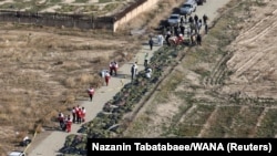 Тіла загиблих біля місця катастрофи, околиці Тегерану, 8 січня 2020 року