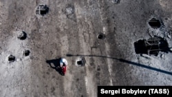 Антонівський міст через Дніпро, який з’єднує окупований Херсон із лівобережжям, після перших ударів по ньому ЗСУ. Херсон, 20 липня 2022 року