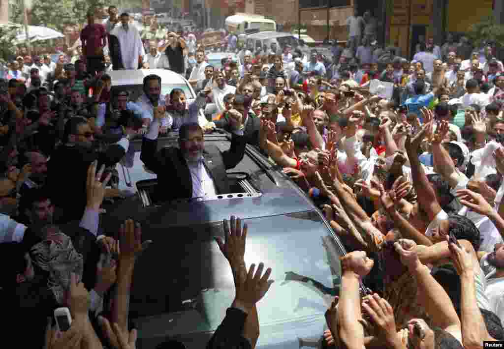 Мухаммед Мурси кандидат в президенты, представляющий &quot;Братьев-мусульман&quot;