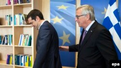 Алексіс Ципрас та Жан-Клод Юнкер під час зістрічі в Брюсселі, 24 червня, 2015 року 