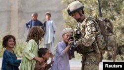 Майор 2-го батальона Королевских гуркских стрелков ВС Великобритании Джейми Мюррей, Афганистан, 14 июля 2011 года.