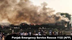 2019-жылы Пенжаб провинциясында күйүп кеткен поезддин сүрөтү. Иллюстрация үчүн колдонулду.
