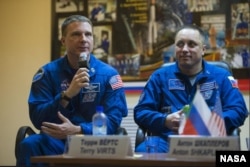 Terry Virts and Anton Shkaplerov ahead of a mission in November 2014