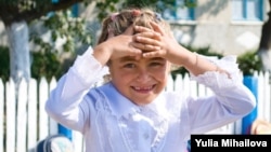 Moldova - Bursuc school, girl in the first form, 18Sep2009