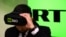 RUSSIA -- A man tries on a VR goggles at the stand of Russia's state-controlled broadcaster RT during the 10th Russian Internet Week in Moscow, November 1, 2017