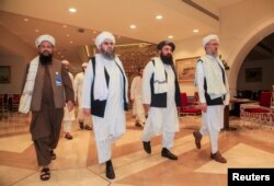 Tálib tárgyalócsapat Dohában, 2021. augusztus 12-én. Pár héttel később már szinte az egész ország urai voltak