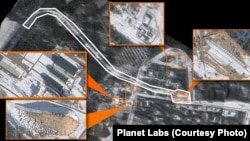 На спутниковом снимке от 24 февраля оранжевым цветом показаны новые застроенные и реконструированные районы, а белым — железнодорожная линия