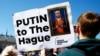 Протестующие у здания Международного суда ООН потребовали ареста российского лидера Владимира Путина. Гаага, Нидерланды, 7 мая 2024 года