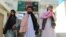 Taliban members leave prison after they were released in Kandahar on June 1 as part of ongoing negotiations with the Afghan government. 