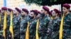 Luptători Hezbollah care participă la o ceremonie funerară pe 25 septembrie.