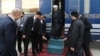 Президент Ирана Хасан Роухани после прибытия на станцию Ак-Яйла на железной дороге, соединившей Казахстан, Туркменистан и Иран. 3 декабря 2014 года.