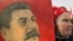 Russia - A woman carries the portrait of Josef Stalin during the pro-Communist demonstration in Moscow, 01May2007