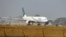 FILE: A Pakistan International Airline (PIA) plane taxis on the runway on the way to Saudi Arabia in February 2016.