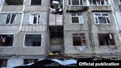 Damage to buildings in Stepanakert, the main city of Nagorno-Karabakh, after reported shelling. 