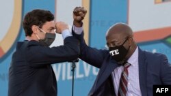 Рафаэл Уорнок жана Жон Оссофф.