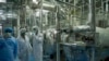 Technicians from the International Atomic Energy Agency inspect the site of the uranium conversion plant in Isfahan, Iran. (file photo)