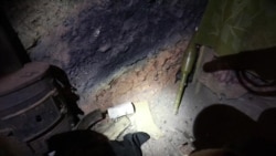 A dugout on the slagheap near the city of Zolote