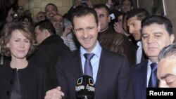 Predsjednik Bashar al-Assad sa suprugom Asmom, 2012. 