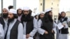Newly freed Taliban prisoners are processed at Bagram prison, north of Kabul, on April 9.