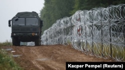 Poland has sent thousands of soldiers to its borders and also started building a barbed-wire fence.