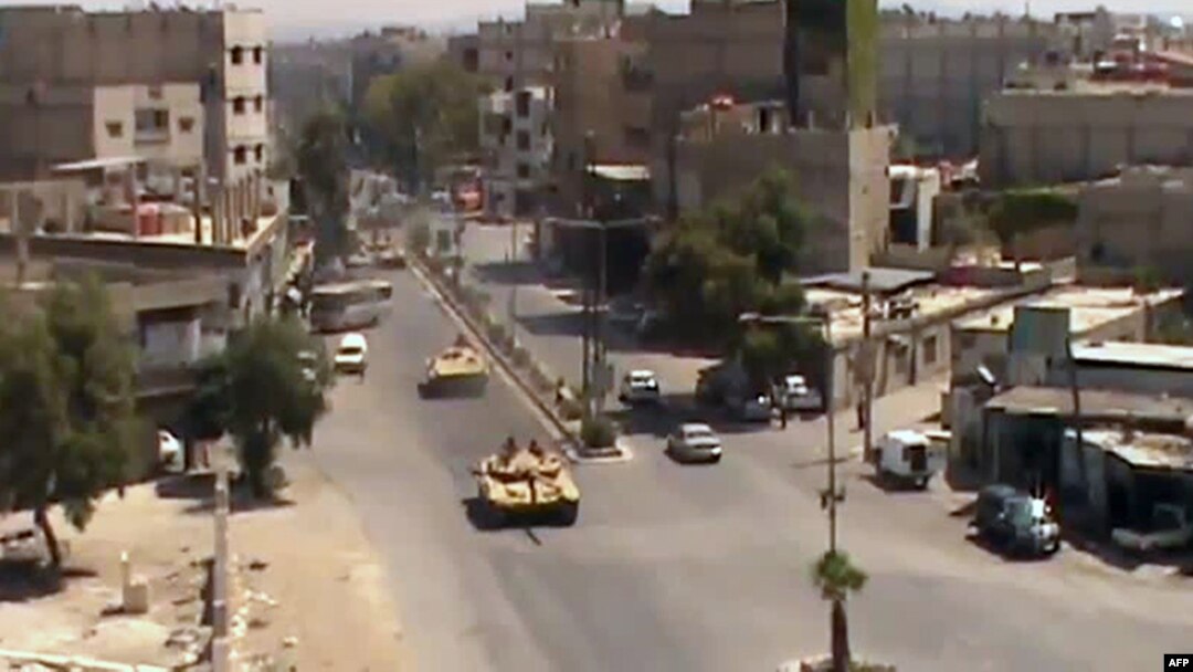 Snimak sa videa koji pokazuje tenkove pro vladinih snaga u delu Damaska