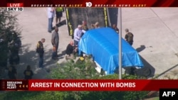 Автомобиль подозреваемого подготовлен к эвакуации и грузится на платфору - для изучения. 26 октября 2018.
