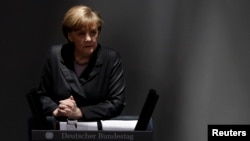 Анґела Меркель виступає у Бундестазі, Берлін, 13 березня 2014 року